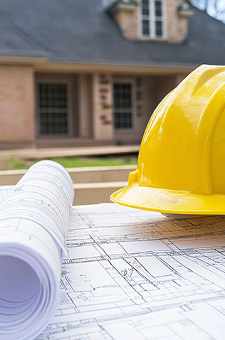 Construction workers building a new home for Global Home Improvements.