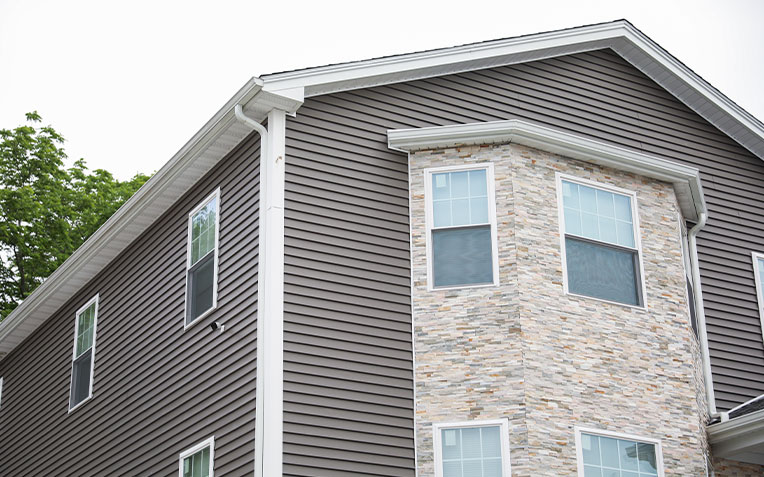 High-quality siding installation by Global Home Improvements for a residential home exterior.